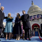 
              FILE - Joe Biden is sworn in as the 46th president of the United States by Chief Justice John Roberts as Jill Biden holds the Bible during the 59th Presidential Inauguration at the U.S. Capitol in Washington, on Jan. 20, 2021, as their children Ashley and Hunter watch.(AP Photo/Andrew Harnik, Pool, File)
            