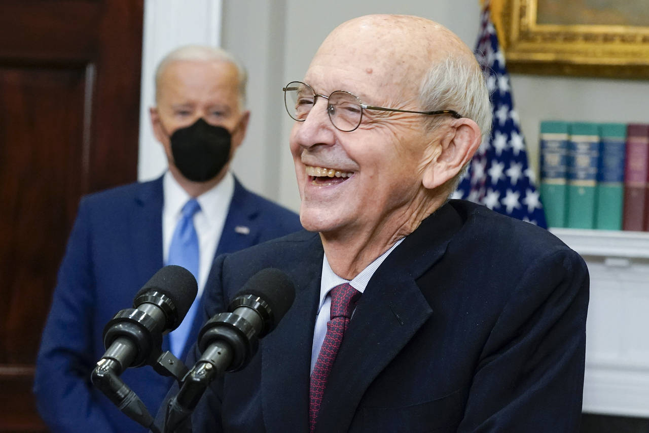 President Joe Biden listens as Supreme Court Associate Justice Stephen Breyer announces his retirem...