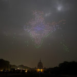 
              Dozens of drones fly forming India's map on the eve of Republic Day celebrations in New Delhi, India, Tuesday, Jan. 25, 2022. (AP Photo/Altaf Qadri)
            