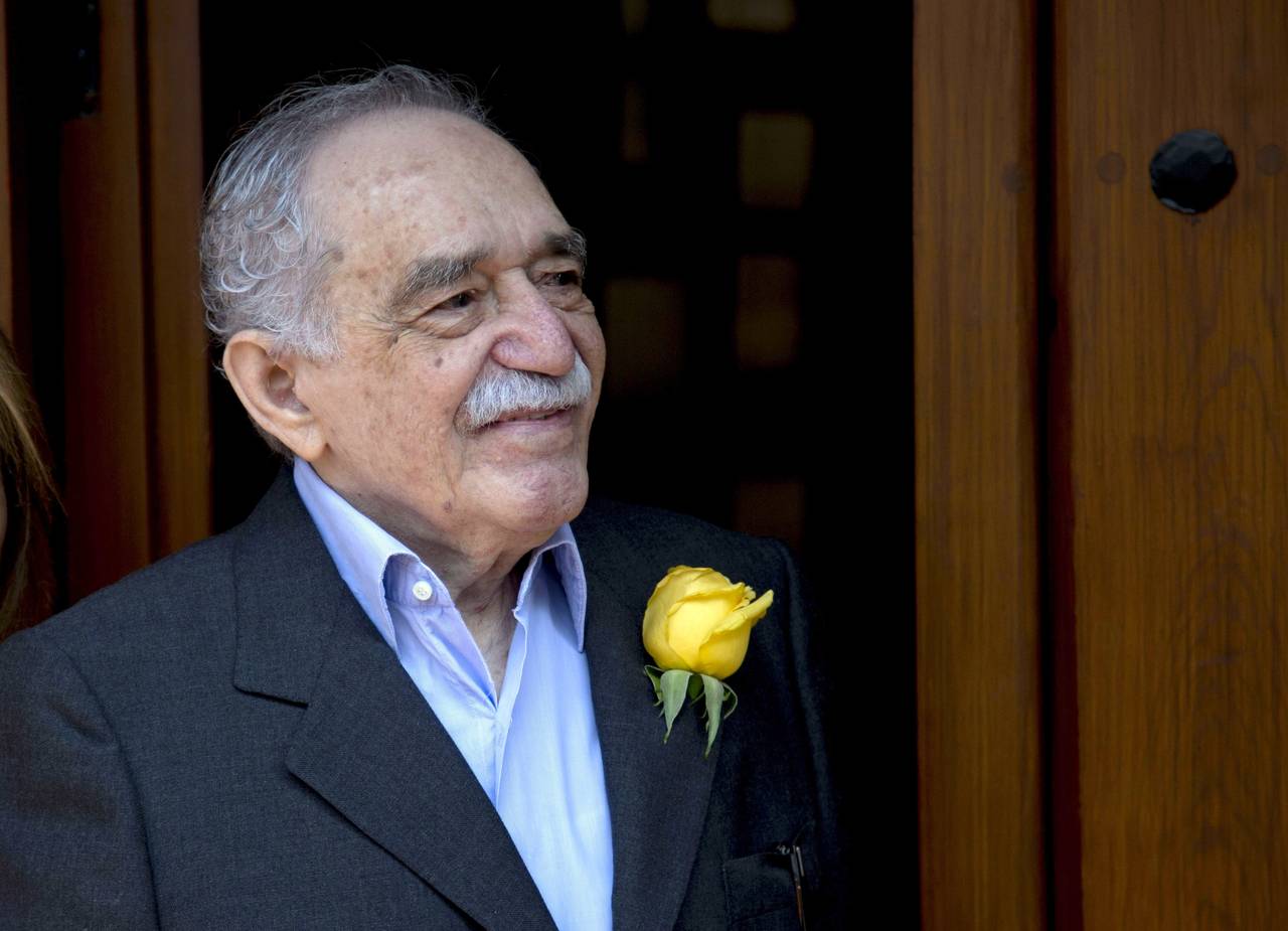 FILE - Colombian Nobel Literature laureate Gabriel Garcia Marquez greets fans and reporters outside...