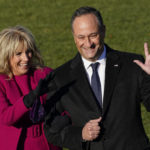 
              FILE - Doug Emhoff, husband of Vice President Kamala Harris, and first lady Jill Biden arrive before President Joe Biden signs the $1.2 trillion bipartisan infrastructure bill into law during a ceremony on the South Lawn of the White House in Washington, on Nov. 15, 2021. (AP Photo/Susan Walsh, File)
            