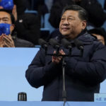 
              Chinese President Xi Jinping reacts during the opening ceremony of the 2022 Winter Olympics, Friday, Feb. 4, 2022, in Beijing. (AP Photo/Jae C. Hong)
            