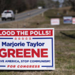 
              A sign for Rep. Marjorie Taylor Greene sits along a rural road outside of Rockmart, Ga., in Georgia's 14th Congressional district Saturday, Feb. 5, 2022. Georgia will hold its Republican primary on May 24. (AP Photo/Ben Gray)
            