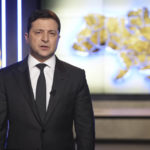 
              In this handout photo taken from video provided by the Ukrainian Presidential Press Office, Ukrainian President Volodymyr Zelenskyy addresses the nation in Kyiv, Ukraine, Thursday, Feb. 24, 2022. Zelenskyy declared martial law, saying Russia has targeted Ukraine's military infrastructure. He urged Ukrainians to stay home and not to panic. (Ukrainian Presidential Press Office via AP)
            