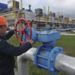 
              FILE - A worker at a Ukrainian gas station Volovets in western Ukraine Wednesday, in Oct. 7, 2015. Fears are rising about what would happen to Europe's energy supply if Russia were to invade Ukraine and then shut off its natural gas in retaliation for U.S. and European sanctions. The pipeline operators have told the European Union's executive commission that if there's a cold winter, the continent's gas companies will need to import more than they have in the past. (AP Photo/Pavlo Palamarchuk, File)
            