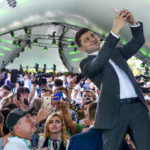 
              FILE Ukrainian President Volodymyr Zelenskyy takes a selfie at the first congress of his party called Servant of the People in the city Botanical Garden, Kiev, Ukraine, Sunday, June 9, 2019. As a political novice running to be Ukraine’s president, Volodymyr Zelenskyy vowed to reach out to Russia-backed rebels in the east who were fighting Ukrainian forces and make strides toward resolving the conflict. The assurances contributed to his landslide victory in 2019. (AP Photo/Zoya Shu, File)
            
