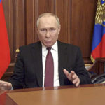 
              In this image made from video released by the Russian Presidential Press Service, Russian President Vladimir Putin addressees the nation in Moscow, Russia, Thursday, Feb. 24, 2022. Russian troops launched their anticipated attack on Ukraine on Thursday, as Putin cast aside international condemnation and sanctions and warned other countries that any attempt to interfere would lead to "consequences you have never seen."  (Russian Presidential Press Service via AP)
            