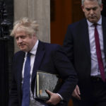 
              Britain's Prime Minister Boris Johnson leaves 10 Downing Street as he makes his way to the parliament to make a statement, in London, Thursday, Feb. 24, 2022. Russia launched a wide-ranging attack on Ukraine on Thursday, hitting cities and bases with airstrikes or shelling, as civilians piled into trains and cars to flee. (AP Photo/Alberto Pezzali)
            