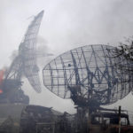 
              Damaged radar arrays and other equipment is seen at Ukrainian military facility outside Mariupol, Ukraine, Thursday, Feb. 24, 2022. Russia has launched a barrage of air and missile strikes on Ukraine early Thursday and Ukrainian officials said that Russian troops have rolled into the country from the north, east and south. (AP Photo/Sergei Grits)
            