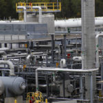 
              FILE - Tanks and pipes move product through the MarkWest Bluestone Gas Processing Plant in Evans City, Pa. in Oct. 17, 2019. Over the past month, two-thirds of American LNG exports went to Europe. The U.S. has pledged to help maintain Europe's energy supply by boosting exports of liquefied natural gas, or LNG, if Russia were to invade Ukraine and reduce its gas shipments to the European Union. (AP Photo/Keith Srakocic, File)
            