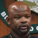 
              FILE - Broward Sheriff Gregory Tony announces that two additional deputies have been fired as a result of the agency's internal affairs investigation into the mass shooting at Marjory Stoneman Douglas High School in Parkland, at the Broward Sheriff's Office headquarters in Fort Lauderdale, Fla., Wednesday, June 26, 2019. Florida Gov. Ron DeSantis said Tuesday, Feb. 1, 2022, he will decide soon whether to suspend Tony after state investigators found he lied on police applications about killing someone as a teen, his past drug use and his driving record. (Joe Cavaretta/South Florida Sun-Sentinel via AP, File)
            
