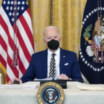 
              President Joe Biden listens during a meeting with the National Governors Association in the East Room of the White House, Monday, Jan. 31, 2022, in Washington. (AP Photo/Alex Brandon)
            