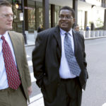 
              FILE - Former Chicago Police Sgt. Ronald Watts, right, leaves the Dirksen U.S. Courthouse after being sentenced to 22 months in prison Oct. 9, 2013, in Chicago. Nearly 50 more people will have their convictions thrown out after prosecutors in Chicago said Tuesday, Feb. 1, 2022, they are working to right the wrongs of Watts who framed or falsely accused over 100 poor residents of drug crimes. (Phil Velasquez/Chicago Tribune via AP, File)
            