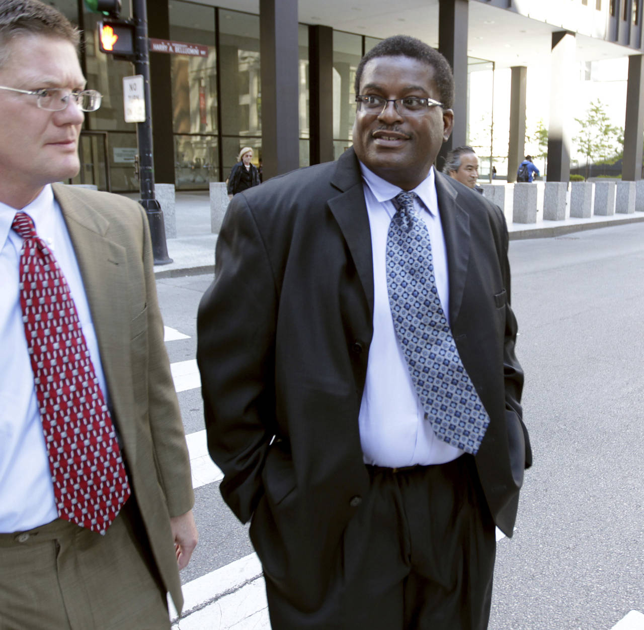 FILE - Former Chicago Police Sgt. Ronald Watts, right, leaves the Dirksen U.S. Courthouse after bei...
