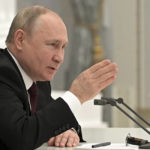 
              Russian President Vladimir Putin speaks during a Security Council meeting in the Kremlin in Moscow, Russia, Monday, Feb. 21, 2022. Putin has convened top officials to consider recognizing the independence of separatist regions in eastern Ukraine. Such a move would ratchet up tensions with the West amid fears that the Kremlin could launch an invasion of Ukraine imminently. (Alexei Nikolsky, Sputnik, Kremlin Pool Photo via AP)
            