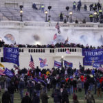 
              FILE - Violent protesters, loyal to President Donald Trump, storm the Capitol on Jan. 6, 2021, in Washington. The platform Gab launched in 2016 and now claims to have 15 million monthly visitors, though that number could not be independently verified. The service says it saw a huge jump in signups following the January 6 riot, which prompted Facebook, Twitter and YouTube to crack down on Trump and others who they said had incited violence. (AP Photo/John Minchillo, File)
            