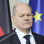 
              German Chancellor Olaf Scholz comments on the Russian attack on Ukraine during a press conference at the Chancellery in Berlin, Germany, Thursday, Feb.22, 2022. Russian troops launched the expected attack on Ukraine on Thursday. (Michael Kappeler/dpa via AP)
            