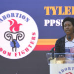 
              The Mississippi director for Planned Parenthood Southeast, Tyler Harden, tells an audience of reproductive rights supporters that efforts to limit abortion access are "just another form of oppression" for women of color, at a rally in Smith Park Jackson, Miss., on Dec. 1, 2021. (AP Photo/Rogelio V. Solis)
            