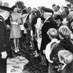 
              FILE - Local residents who had sat for hours to greet Britain's Queen Elizabeth II after her arrival at Mercury Bay, New Zealand, March 23, 1970, left their rugs as a carpet on which Her Majesty could tread as she landed from the barge from the Royal Yacht Britannia. Britain is marking Queen Elizabeth II's Platinum Jubilee on Sunday, Feb. 6, 2022,  70 years after she ascended to the throne.  (AP Photo, File)
            