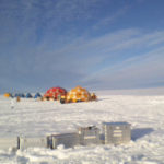 
              This photo provided by environmental scientist David Holland shows tents set up on the Dotson Ice Shelf in Antarctica on Monday, Jan. 31, 2022. A large iceberg broke off the deteriorating Thwaites glacier and along with sea ice it is blocking two research ships with dozens of scientists from examining how fast its crucial ice shelf is falling apart. The smaller Dotson ice shelf is about 87 miles (140 kilometers) west of the Thwaites ice shelf. (David Holland via AP)
            