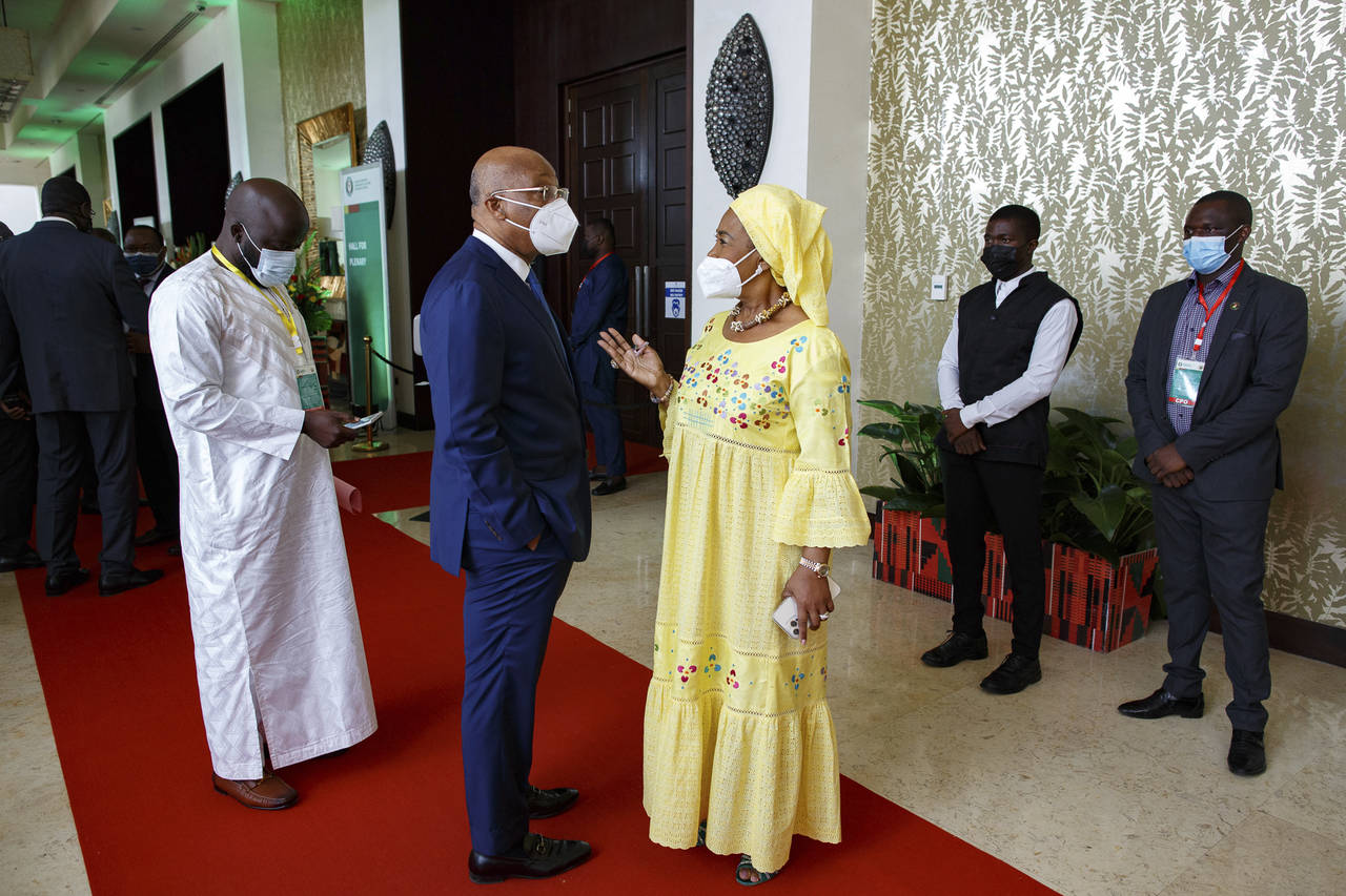 Ghana Foreign Minister Shirley Ayorkor Botchwey, right, speaks with ECOWAS president, Jean Claude K...