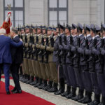 
              President Joe Biden participates in an arrival ceremony with Polish President Andrzej Duda at the Presidential Palace, Saturday, March 26, 2022, in Warsaw. (AP Photo/Evan Vucci)
            
