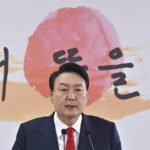 
              South Korea's president-elect Yoon Suk Yeol speaks during a news conference to address his relocation plans of the presidential office, in Seoul, South Korea, Sunday, March 20, 2022. (Jung Yeon-je/Pool Photo via AP)
            