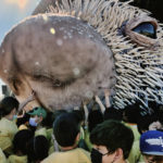 
              Los Angeles school children reach out to touch a giant puppet porcupine named Percy at Elysian Park in Los Angeles on Tuesday, March 1, 2022. Percy, a two-story puppet emerged from its home for an audience of school children and media members at the Los Angeles park on Tuesday. The adorable beast with its massive pink nose inspired oohs and awwws. A joint project of the San Diego Zoo Wildlife Alliance Jim Henson's Creature Shop, Percy was let out to celebrate next week's opening of the zoo's new Wildlife Explorers Basecamp. (AP Photo/Richard Vogel)
            