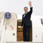 
              U.S. Secretary of State Antony Blinken waves as he boards a plane to depart, Wednesday, March 30, 2022, in Algiers, Algeria, enroute to Washington. (AP Photo/Jacquelyn Martin, Pool)
            