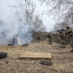 
              Ukrainian soldiers of the 103rd Separate Brigade of the Territorial Defense of the Armed Forces, fire their weapons, during a training exercise, at an undisclosed location, near Lviv, western Ukraine, Tuesday, March 29, 2022. (AP Photo/Nariman El-Mofty)
            