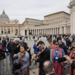 
              Members of the Metis community arrive in St. Peter's Square after their meeting with Pope Francis at The Vatican, Monday, March 28, 2022. (AP Photo/Gregorio Borgia)
            