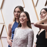 
              Este Haim, from left, Alana Haim, and Danielle Haim arrive at the Oscars on Sunday, March 27, 2022, at the Dolby Theatre in Los Angeles. (Photo by Jordan Strauss/Invision/AP)
            