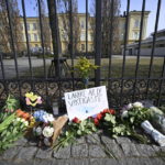 
              Floral tributes outside Malmo Latin School the day after two teachers were killed, in Malmo, Sweden, Tuesday March 22, 2022. Swedish police say two women in their 50s were killed by a student at a high school. Police said Tuesday that an 18-year-old student was arrested at the scene and the victims were teachers at the Malmo Latin School in southern Sweden. Message reads in Swedish, 'Teachers are the most important.' (Johan Nilsson/TT News Agency via AP)
            