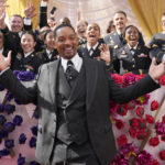 
              Will Smith arrives at the Oscars on Sunday, March 27, 2022, at the Dolby Theatre in Los Angeles. (AP Photo/John Locher)
            