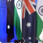 
              This combination photograph released by India's Press Information Bureau shows Australian Prime Minister Scott Morrison, left and Indian Prime Minister Narendra Modi holding a virtual summit, March 21, 2022. Australia said it understands New Delhi's position on the ongoing Ukraine crisis, as the two countries aim to focus on stability in the Indo-Pacific region and pushing through a major trade deal, India’s foreign secretary said on Monday. (Press Information Bureau via AP)
            