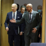 
              U.S. President Joe Biden, left, and European Council President Charles Michel arrive for a round table meeting at an EU summit in Brussels, Thursday, March 24, 2022. As the war in Ukraine grinds into a second month, President Joe Biden and Western allies are gathering to chart a path to ramp up pressure on Russian President Vladimir Putin while tending to the economic and security fallout that's spreading across Europe and the world. (AP Photo/Olivier Matthys)
            