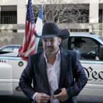 
              Otero County, New Mexico Commissioner Couy Griffin, arrives at the Federal Court House in Washington, Monday, March 21, 2022. Griffin is charged with illegally entering Capitol grounds the day a pro-Trump mob disrupted certification of Joe Biden's presidential election victory on Jan. 6, 2021. (AP Photo/Gemunu Amarasinghe)
            