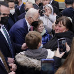 
              President Joe Biden meets with Ukrainian refugees and humanitarian aid workers during a visit to PGE Narodowy Stadium, Saturday, March 26, 2022, in Warsaw. (AP Photo/Evan Vucci)
            