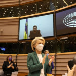 
              European Commission President Ursula von der Leyen applauds after an address by Ukraine's President Volodymyr Zelenskyy, via video link, during an extraordinary session on Ukraine at the European Parliament in Brussels, Tuesday, March 1, 2022. The European Union's legislature meets in an extraordinary session to assess the war in Ukraine and condemn the invasion of Russia. EU Commission President Ursula von der Leyen and Council President Charles Michel will be among the speakers. (AP Photo/Virginia Mayo)
            