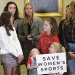 
              Alyssa Amundsen speaks after Governor Kevin Stitt signed a bill into law that prevents transgender girls and women from competing on female sports teams at the Capitol Wednesday, March 30, 2022 in Oklahoma City, Oka. The bill, which easily passed the Republican-led House and Senate mostly along party lines, took effect immediately with the governor's signature. It applies to female sports teams in both high school and college.  (Doug Hoke /The Oklahoman via AP)
            