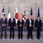 
              From left, Japan's Prime Minister Fumio Kishida, Canada's Prime Minister Justin Trudeau, U.S. President Joe Biden, Germany's Chancellor Olaf Scholz, British Prime Minister Boris Johnson, France's President Emmanuel Macron, Italy's Prime Minister Mario Draghi pose for a G7 leaders' group photo during a NATO summit in Brussels, Thursday March 24, 2022. (Henry Nicholls/Pool via AP)
            