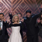 
              The cast of "Coda" accepts the award for outstanding performance by a cast in a motion picture and signs "I love you" at the 28th annual Screen Actors Guild Awards at the Barker Hangar on Sunday, Feb. 27, 2022, in Santa Monica, Calif. (AP Photo/Chris Pizzello)
            