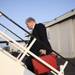 
              Britain's Prime Minister Boris Johnson walks to board a plane at Stansted airport, England to attend a special meeting of NATO leaders in Brussels Thursday March 24, 2022. Western leaders are arriving in Brussels for Thursday's summits taking place at NATO and EU headquarters where they will seek to highlight their sense of unity in the face of the Russian invasion in Ukraine. (Henry Nicholls/Pool via AP)
            