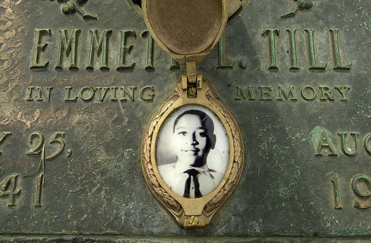 FILE - In this May 4, 2005 file photo, Emmett Till's photo is seen on his grave marker in Alsip, Il...