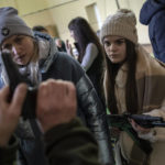 
              Ukrainian civilians receive weapons training, in the outskirts of Lviv, western Ukraine, Monday, March 7, 2022. (AP Photo/Bernat Armangue)
            