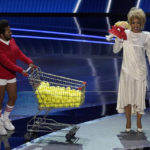 
              Hosts Wanda Sykes, left, and Regina Hall appear on stage dressed as a characters from "King Richard" and "The Eyes of Tammy Faye," during a skit at the Oscars on Sunday, March 27, 2022, at the Dolby Theatre in Los Angeles. (AP Photo/Chris Pizzello)
            