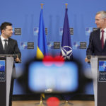 
              FILE - NATO Secretary General Jens Stoltenberg, right, and Ukraine's President Volodymyr Zelenskyy participate in a media conference at NATO headquarters in Brussels, Thursday, Dec. 16, 2021. There will not be a seat reserved anywhere for Ukraine President Volodymyr Zelenskyy to attend back to back summits of leaders in Brussels on Thursday, March 24, 2022, yet he will be on everyone's mind, to least because he has been crystal clear what he wants from Western allies. (AP Photo/Olivier Matthys, File)
            