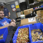
              KelTec employee James Cole loads testing rounds at their gun manufacturing facility on Thursday, March 17, 2022, in Cocoa, Fla. The Florida-based company decided to donate weapons to Ukraine's nascent resistance movement after it could no longer locate a longtime civilian customer in Odessa that had ordered $200,000 worth of rifles before Vladimire Putin's invasion. (AP Photo/Phelan M. Ebenhack)
            