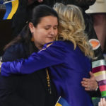 
              Ukraine Ambassador to the United States, Oksana Markarova, gets a hug from first lady Jill Biden during President Joe Biden's first State of the Union address to a joint session of Congress, at the Capitol in Washington, Tuesday, March 1, 2022. (AP Photo/J. Scott Applewhite, Pool)
            