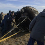 
              Russian Search and Rescue teams arrive at the Soyuz MS-19 spacecraft shortly after it landed in a remote area near the town of Zhezkazgan, Kazakhstan with Expedition 66 crew members Mark Vande Hei of NASA, and cosmonauts Pyotr Dubrov, and Anton Shkaplerov of Roscosmos, Wednesday, March 30, 2022.  (Bill Ingalls/NASA via AP)
            